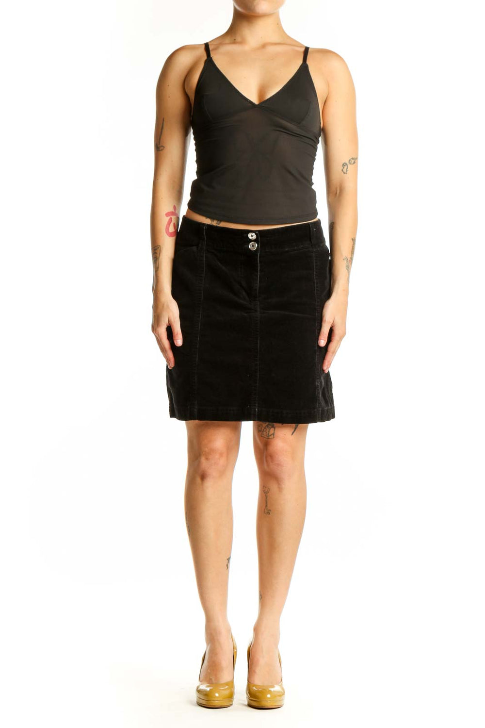 Black velvet mini skirt with dual button detail and straight silhouette, front view