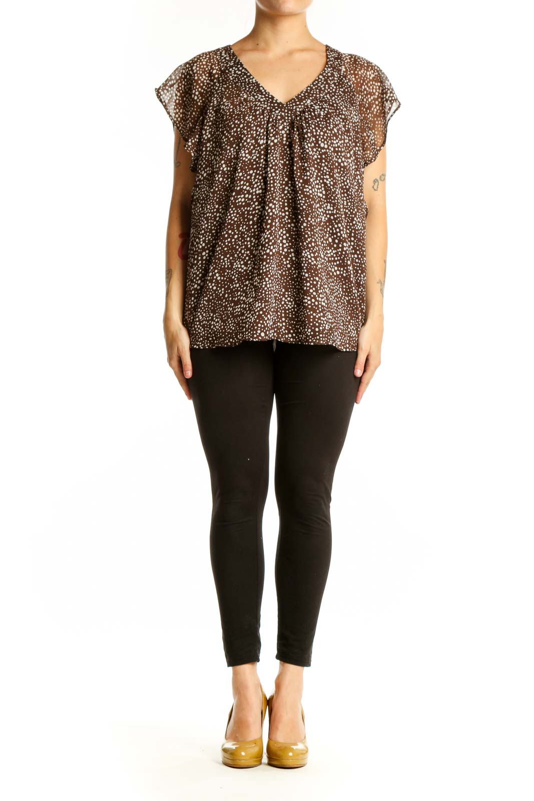 Brown polka dot LOFT top with V-neckline and cap sleeves, front view on model