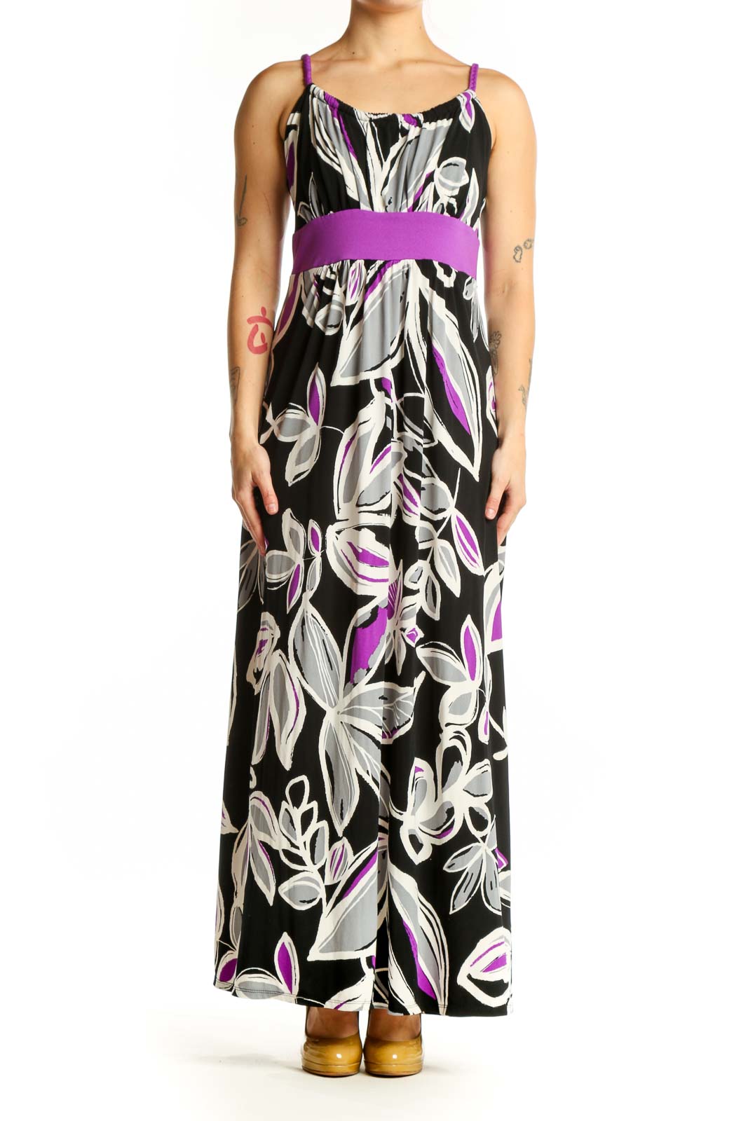 Black floral maxi dress with purple and white botanical print and purple waistband, front view