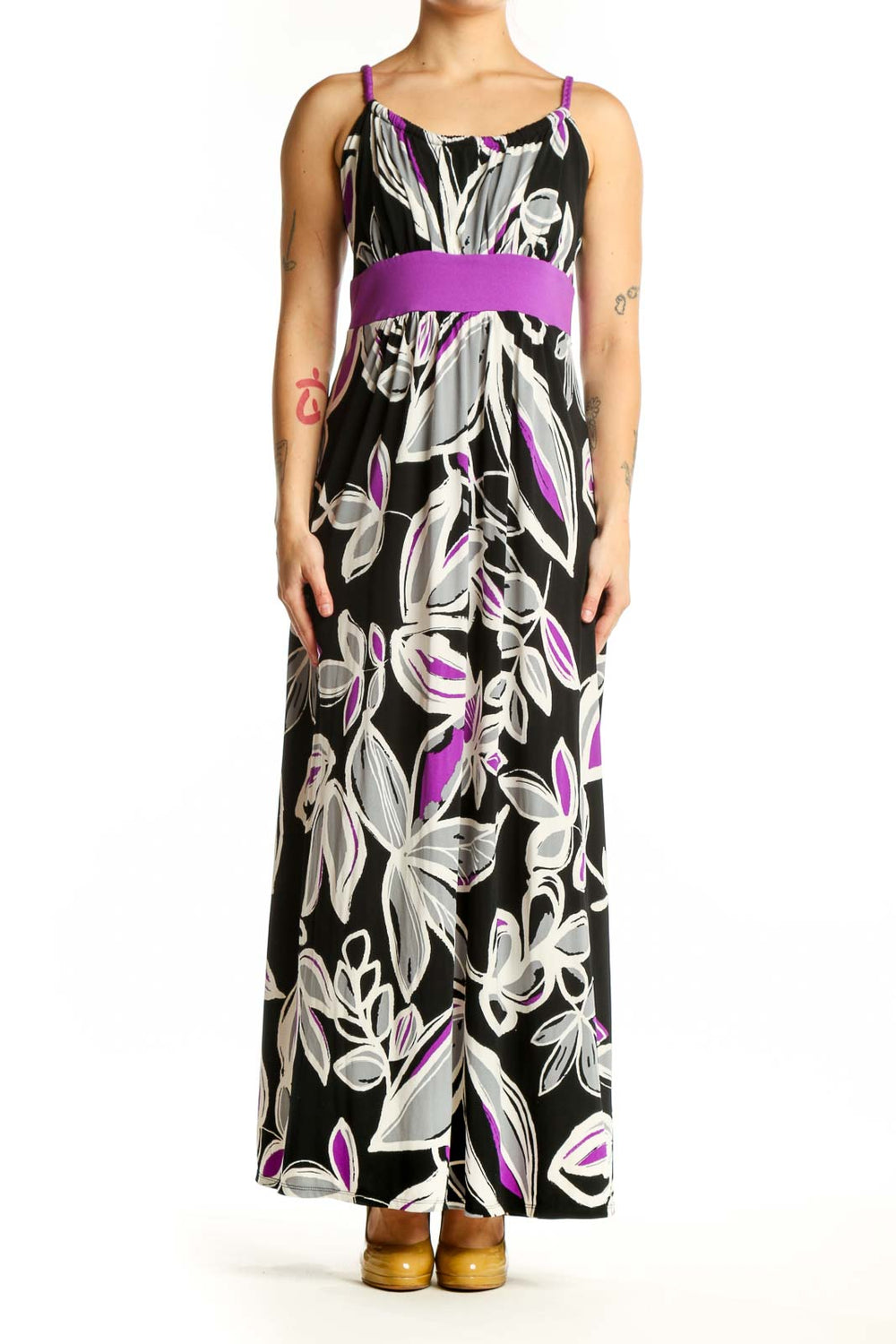 Black floral maxi dress with purple and white botanical print and purple waistband, front view