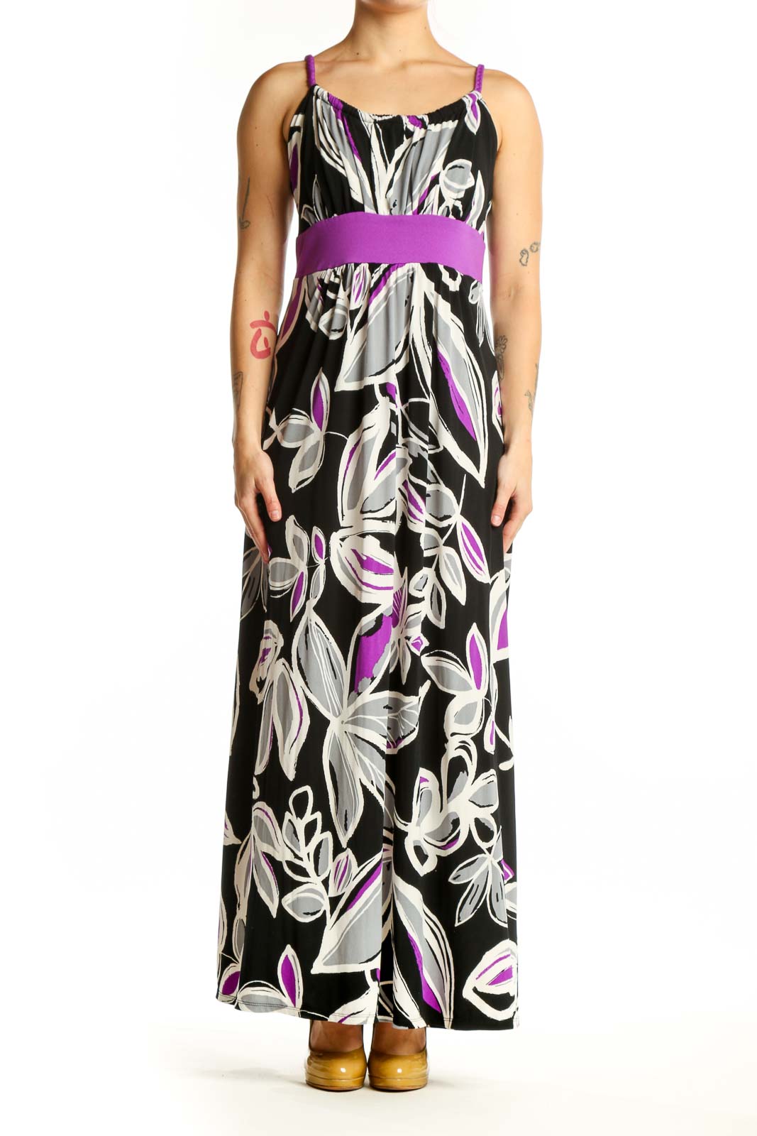 Black floral maxi dress with purple and white botanical print and purple waistband, front view