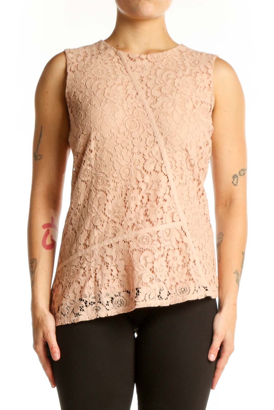 Beige lace sleeveless tank top with intricate floral pattern, front view on model