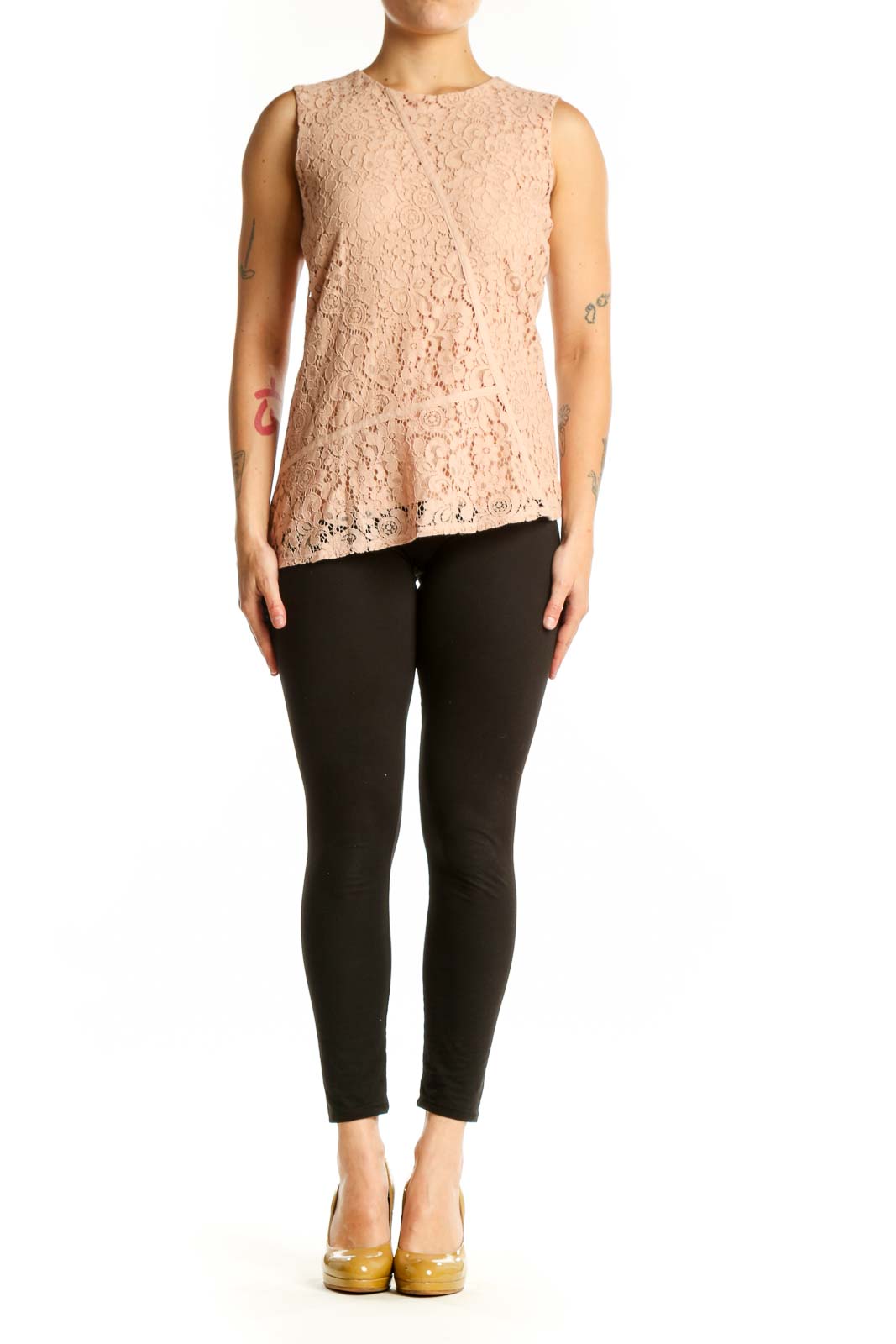 Beige lace sleeveless tank top with intricate floral pattern, front view on model