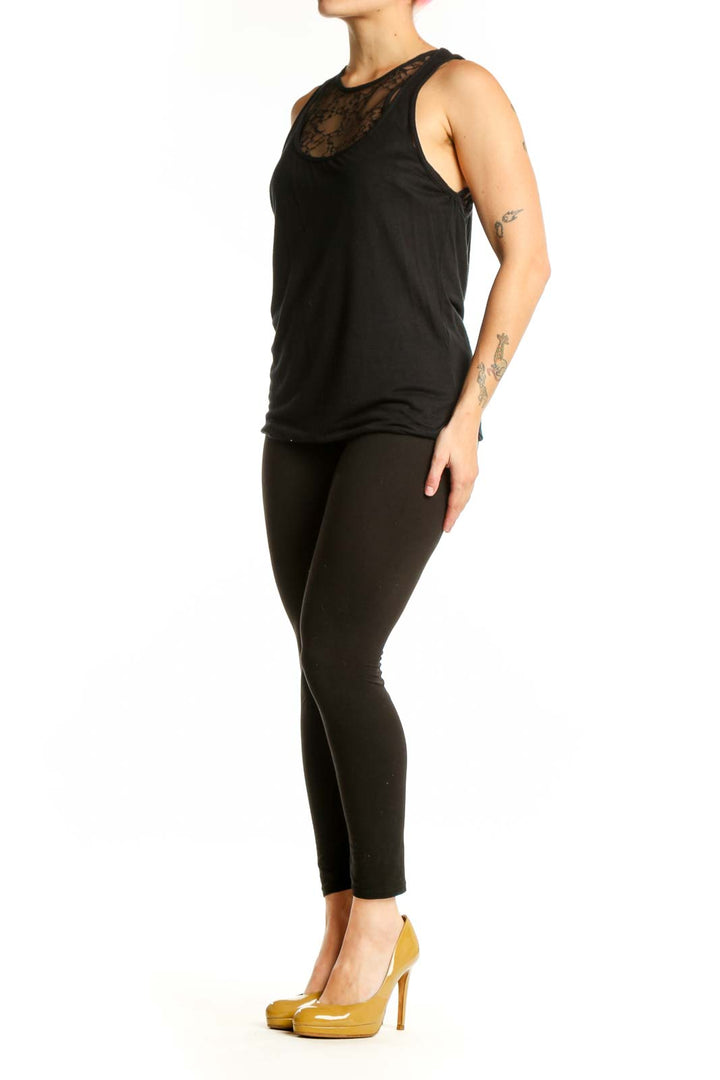 Black lace tank top with sheer lace neckline by Robert Rodriguez, front view