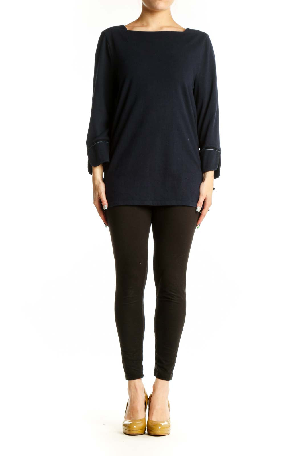 Navy cotton long sleeve top with boat neckline and rolled cuffs, front view on model