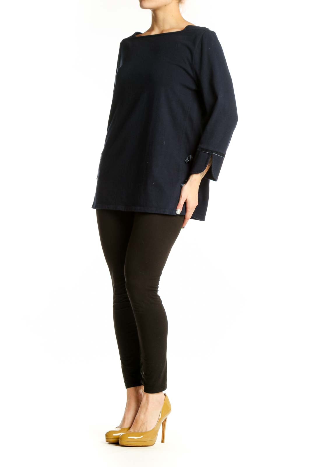 Navy cotton long sleeve top with boat neckline and rolled cuffs, front view on model