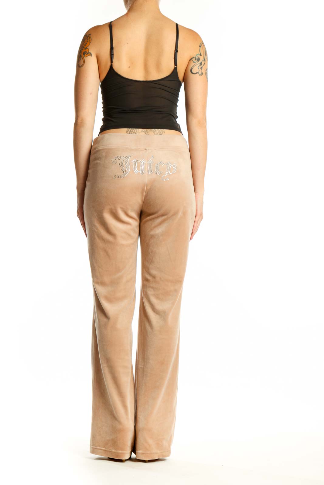 Beige velour activewear pants back view, showing straight-leg silhouette and fit