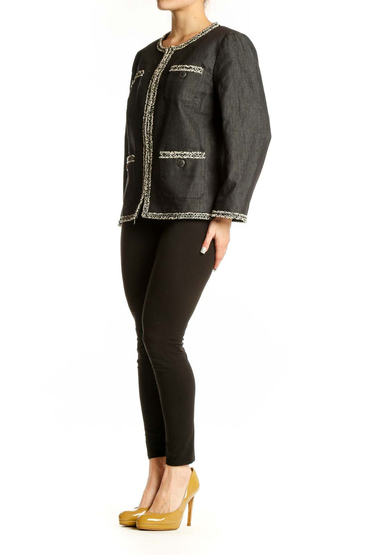 Charcoal tweed blazer with cream and metallic trim detailing, front view on model