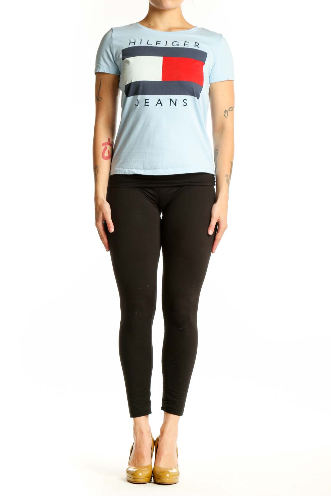 Light blue Hilfiger Jeans graphic t-shirt with colorblock logo design featuring red, navy, and cream stripes