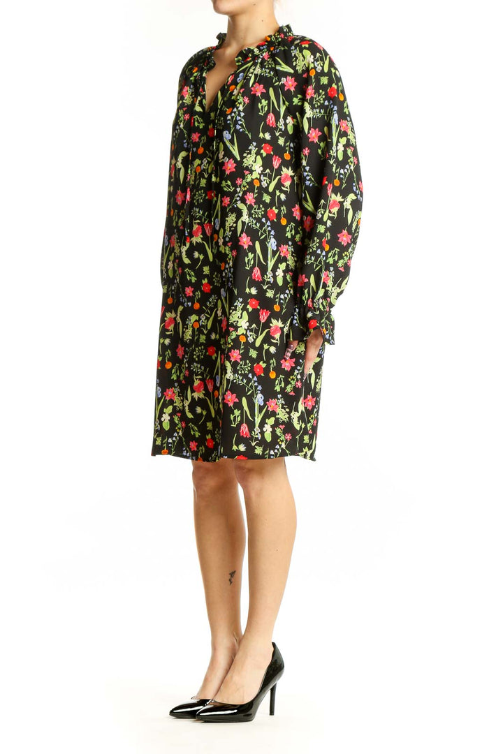 Black floral print polyester dress with V-neckline and long sleeves, front view