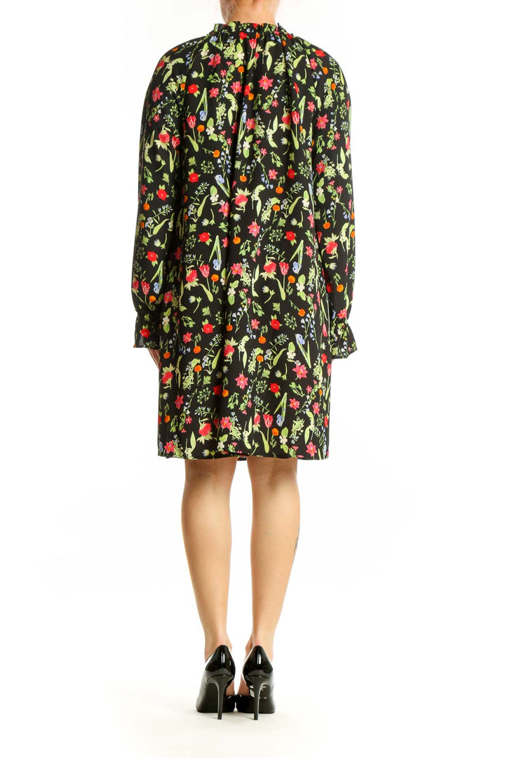 Black floral print polyester dress with ruched shoulders, back view