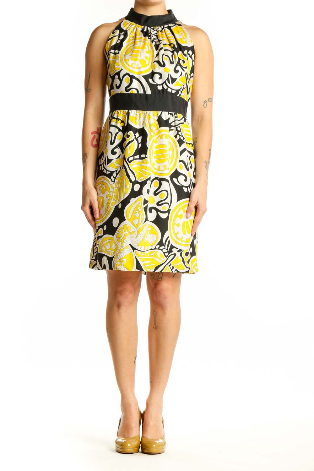 Yellow and black abstract silk halter dress with color-blocked waistband, front view