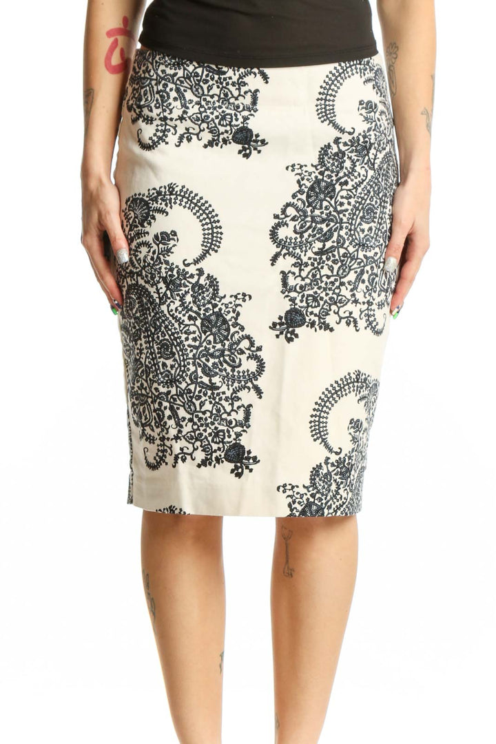 Front view of cream lace paisley pencil skirt with black ornamental pattern and fitted silhouette