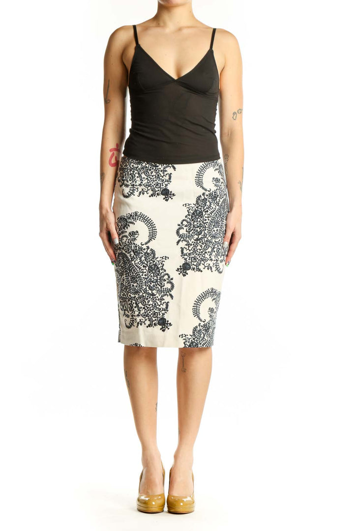 Front view of cream lace paisley pencil skirt with black ornamental pattern and fitted silhouette