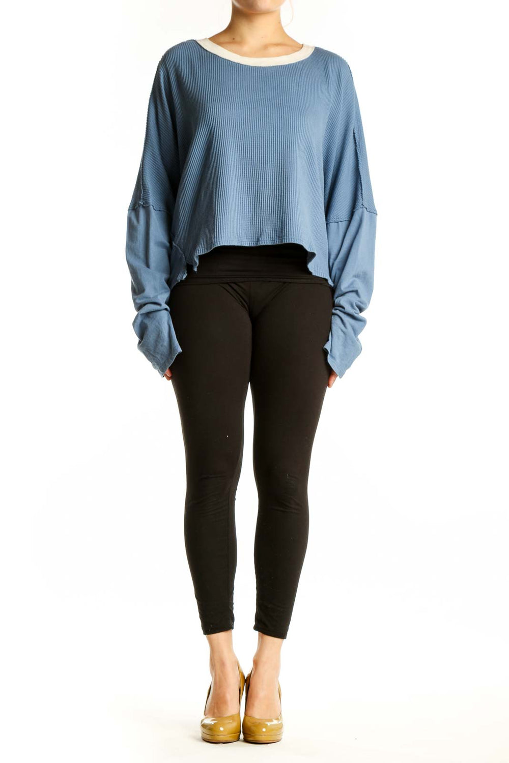 Blue ribbed cotton crop top with oversized sleeves and cream contrast trim, front view