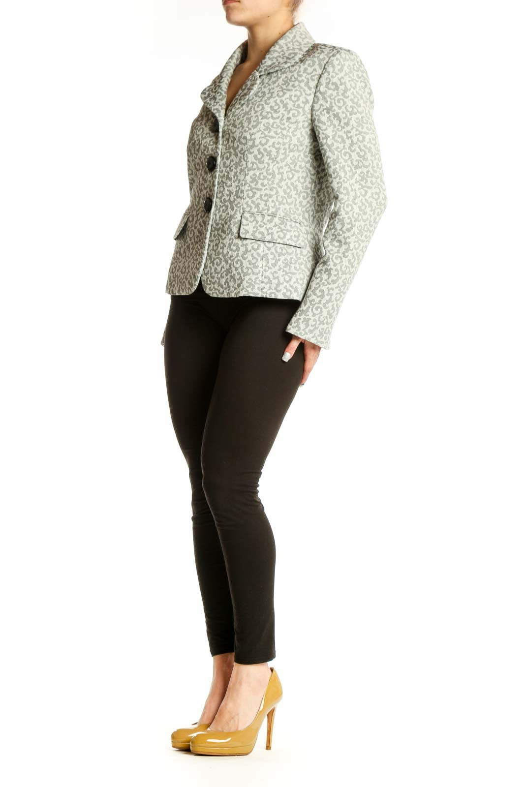 Cream jacquard tailored blazer with black button closures and notched lapels, front view
