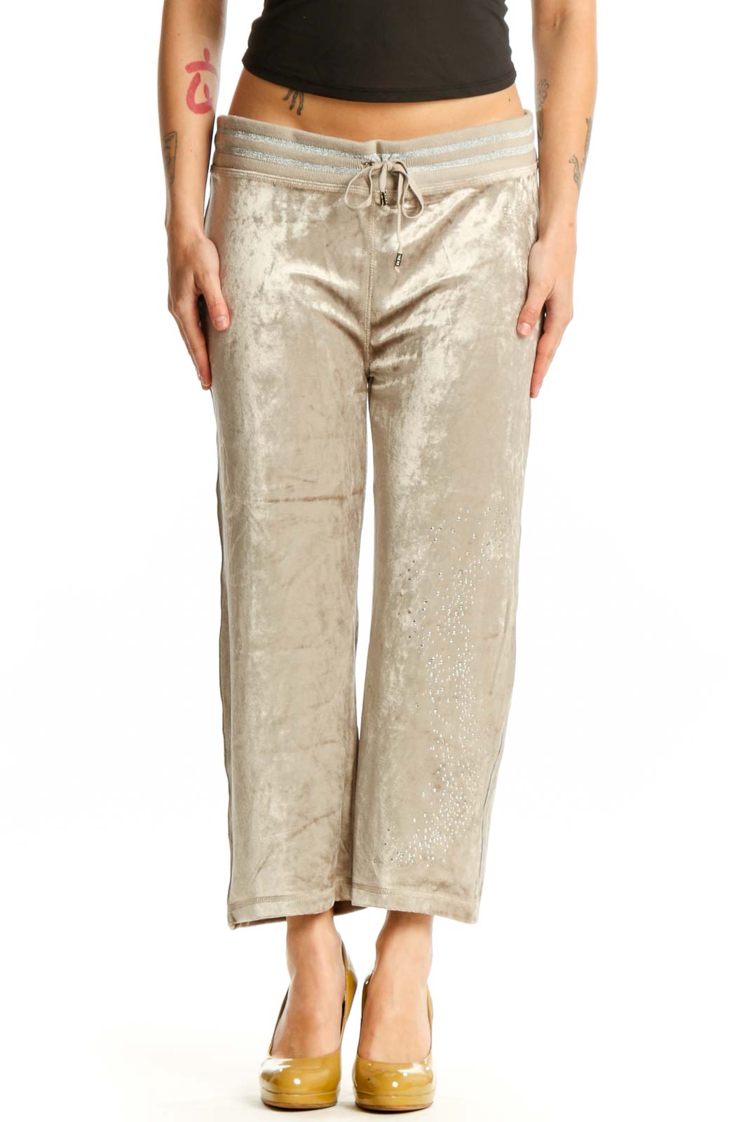 Front view of cream velvet cropped jogger pants with drawstring waistband by BCBG MaxAzria