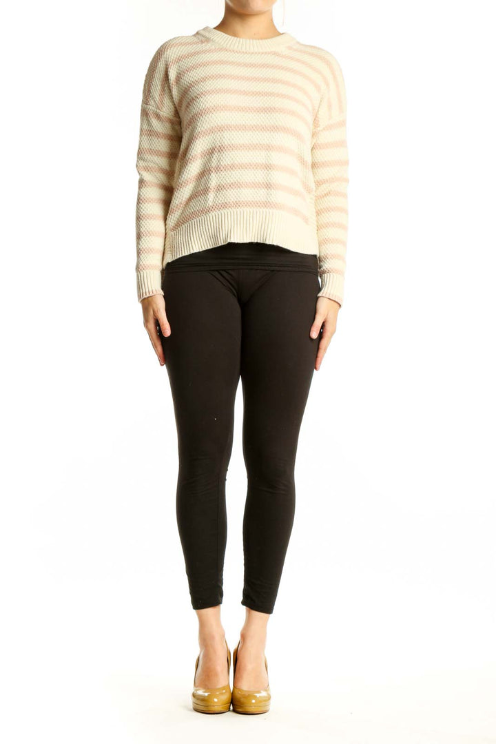 Cream and blush striped knit pullover sweater with crew neckline and ribbed cuffs, front view
