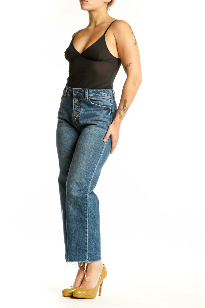 Front view of blue denim cropped straight-leg jeans with high waist and button-fly closure