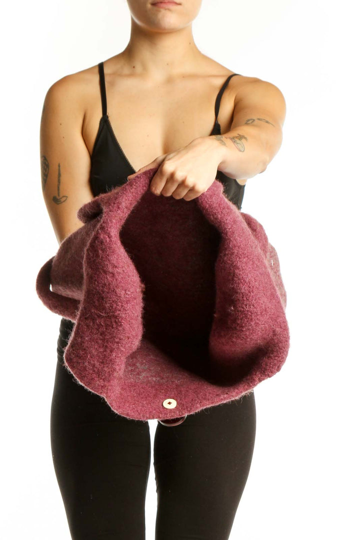 SilkRoll burgundy wool hobo tote bag worn on shoulder, displaying back view and spacious interior design