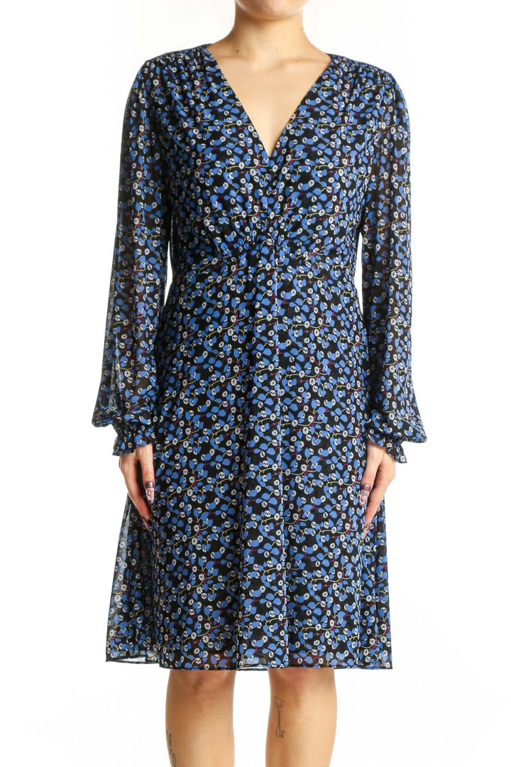 Navy blue floral wrap dress with bell sleeves and V-neckline, front view