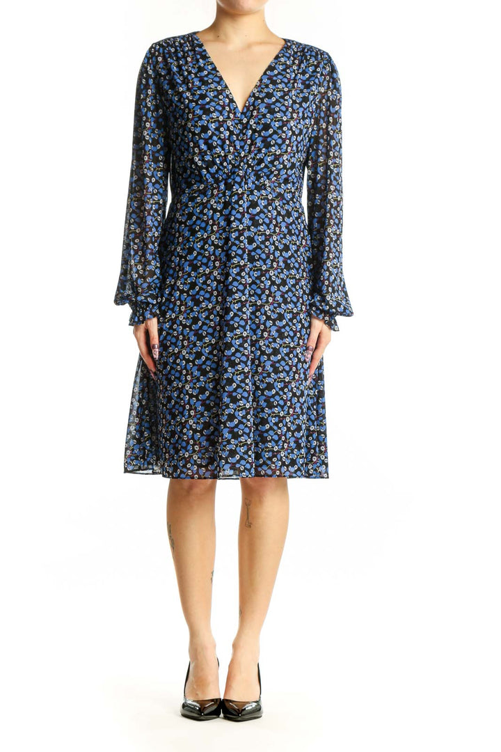 Navy blue floral wrap dress with bell sleeves and V-neckline, front view
