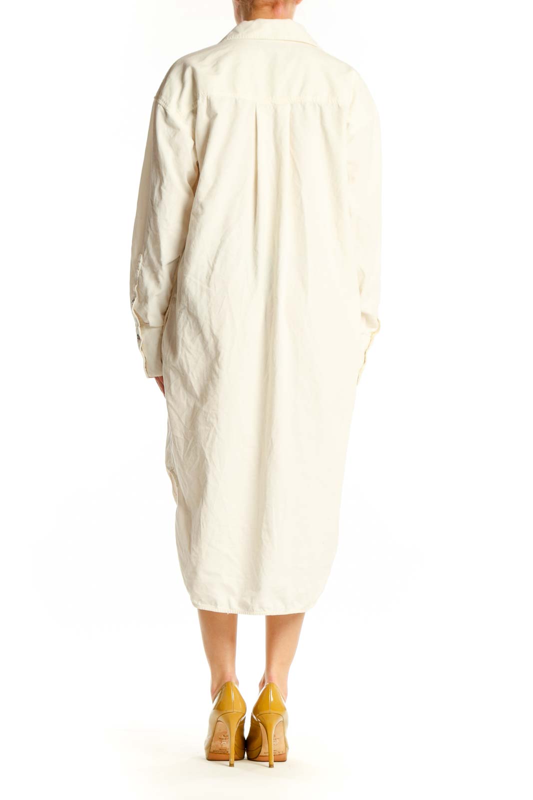 Cream cotton button-front shirt dress by Madewell, back view displaying oversized silhouette and midi length
