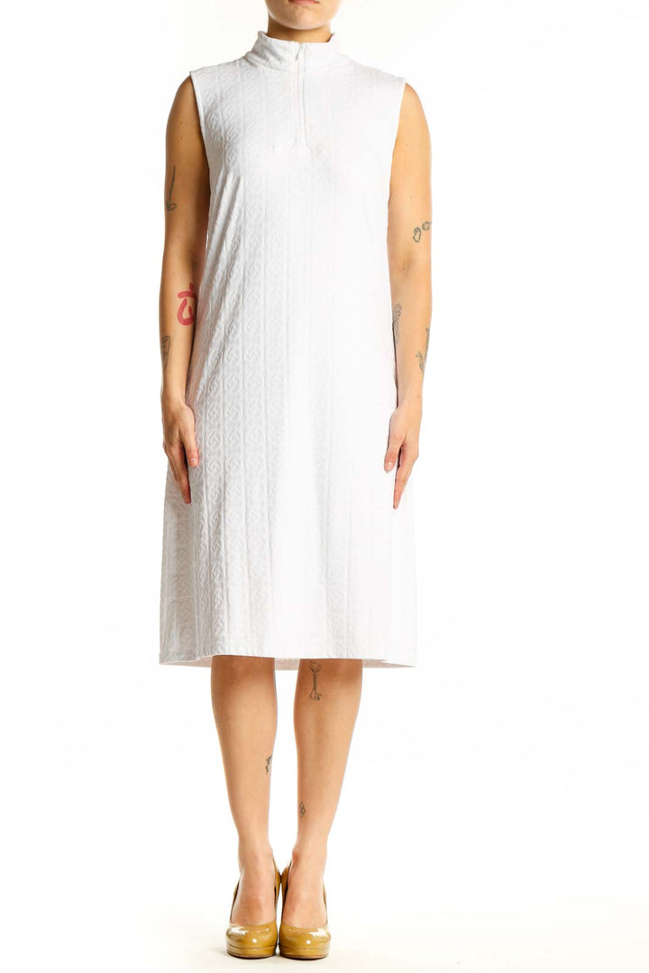 White textured sleeveless midi dress with mock neckline and A-line silhouette, front view
