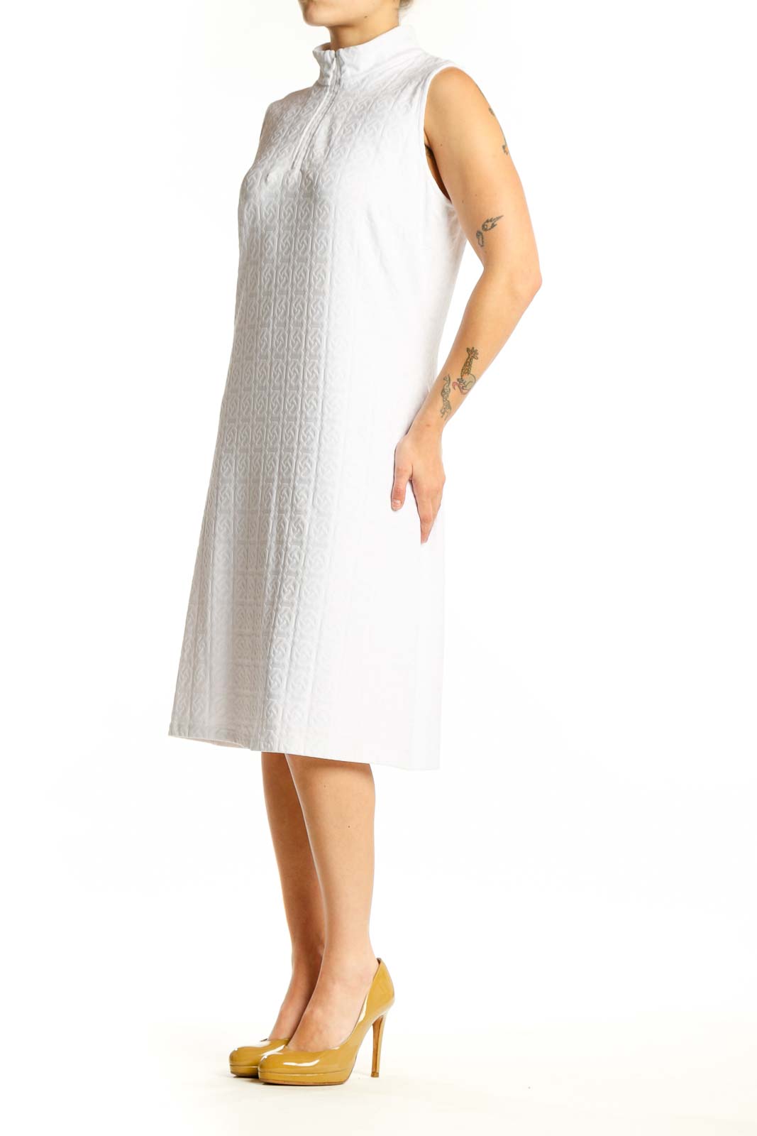 White textured sleeveless midi dress with mock neckline and A-line silhouette, front view