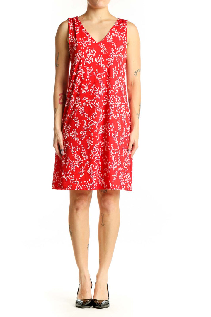 Red floral V-neck sleeveless A-line dress with white flower print, front view