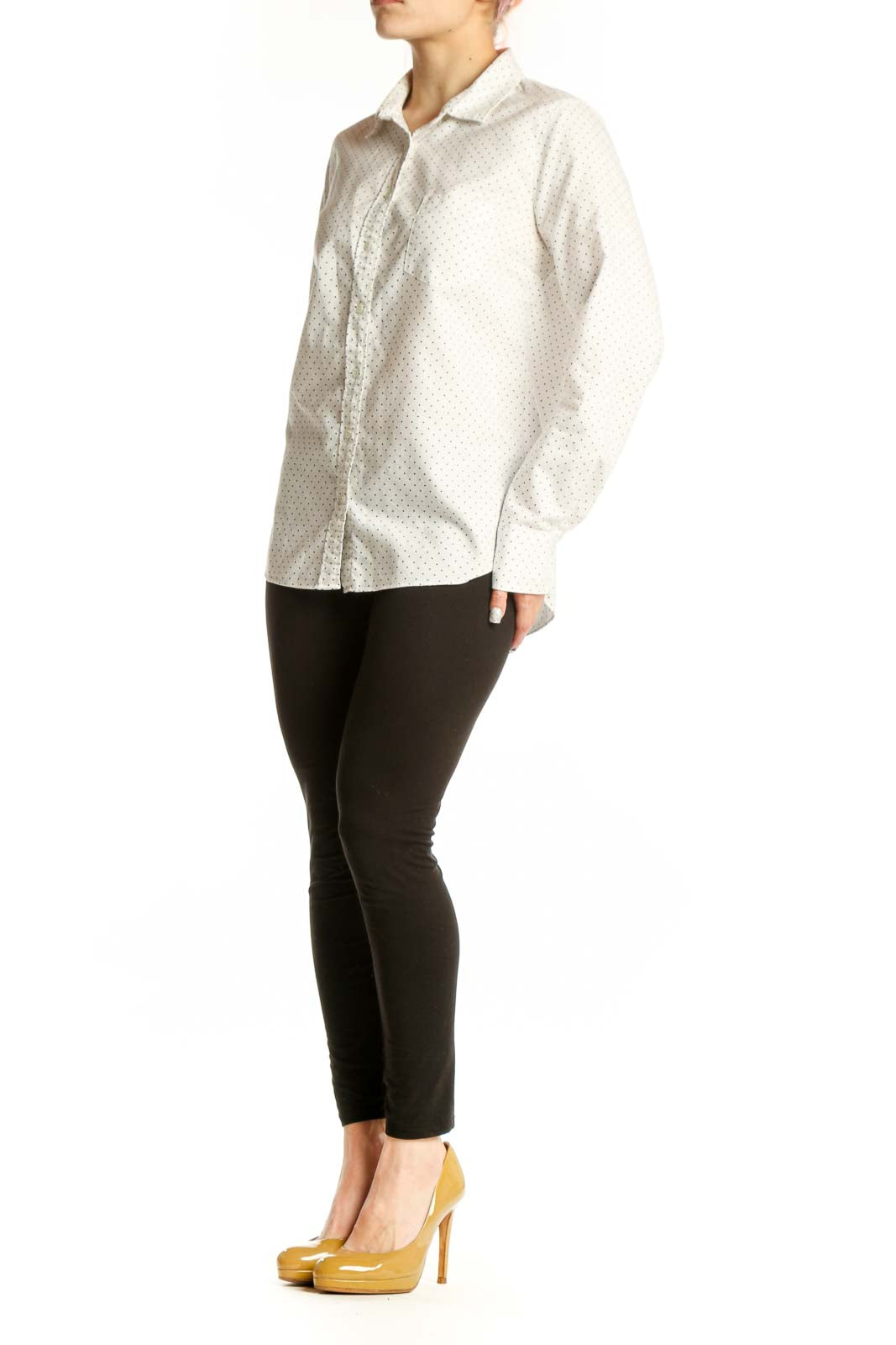 Front view of cream polka dot J.Crew cotton button-up shirt with collared neckline and long sleeves