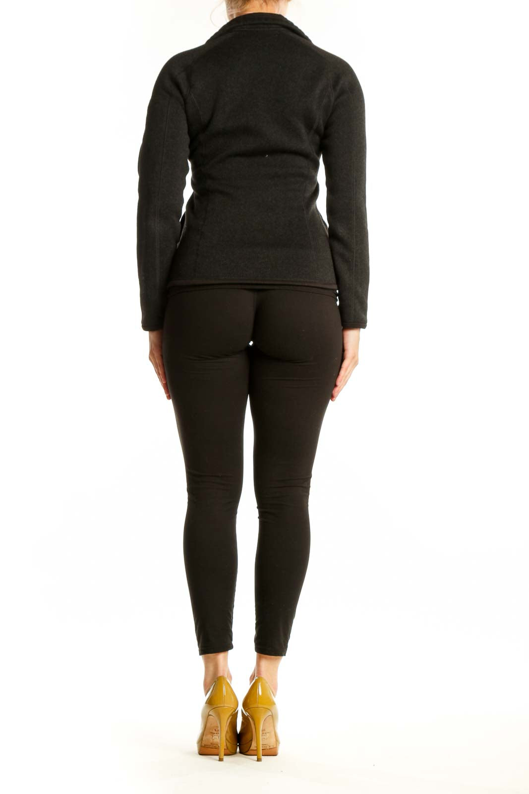 Patagonia black recycled polyester zip-up hoodie back view on model, showing fitted silhouette and side pockets