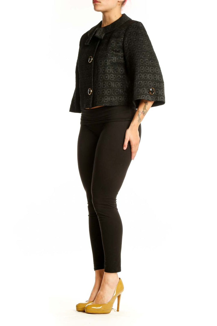 Black geometric jacquard cropped jacket with Peter Pan collar and button front closure