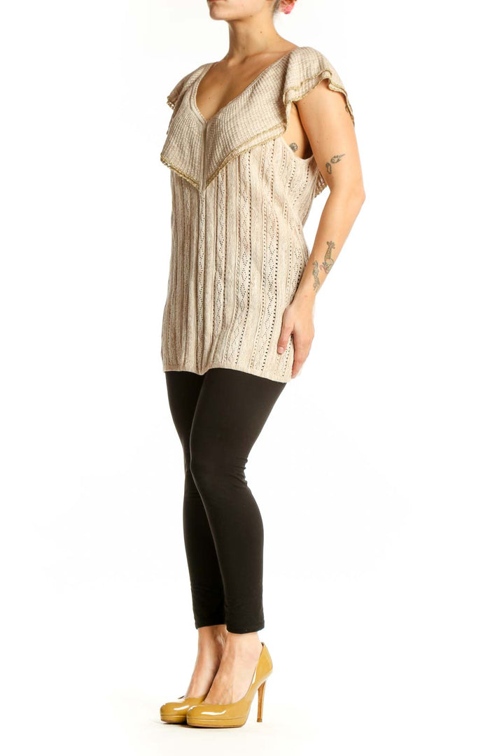 Cream ruffled v-neck knit top with eyelet detailing and flutter sleeves, front view