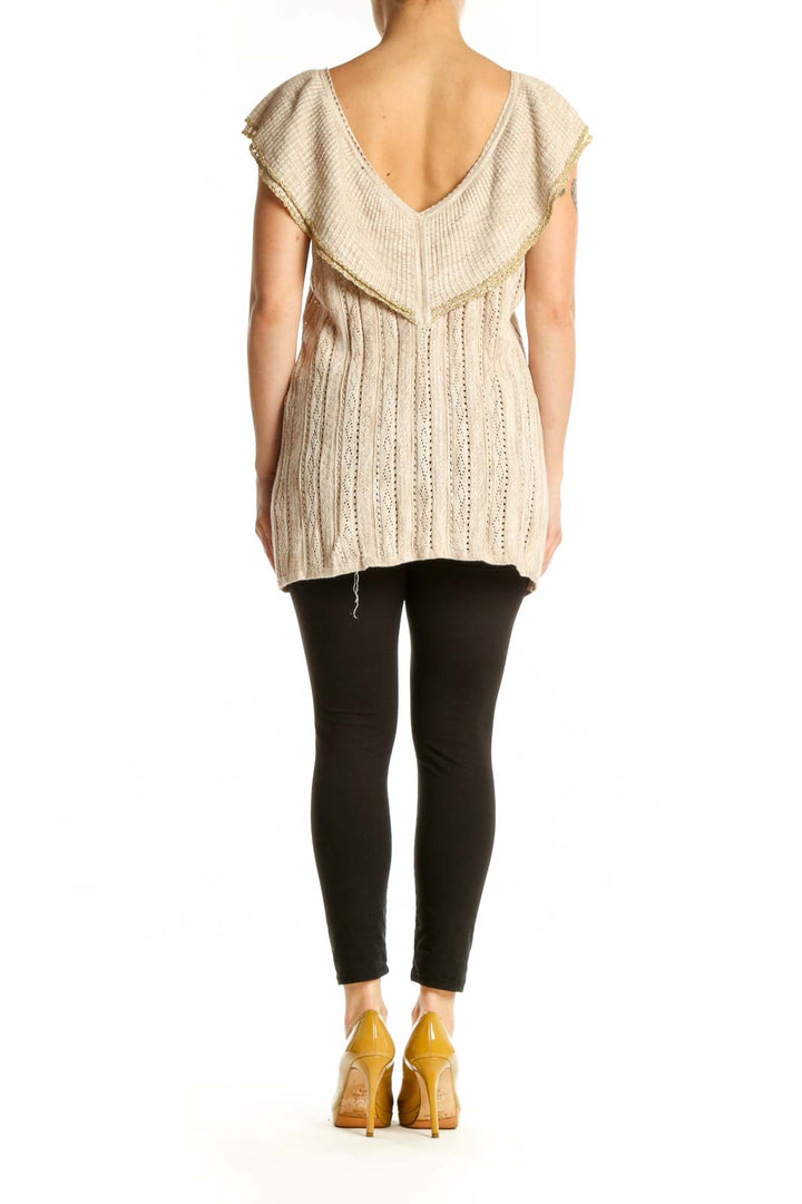 Cream ruffled v-neck knit top with eyelet detailing and flutter sleeves, back view