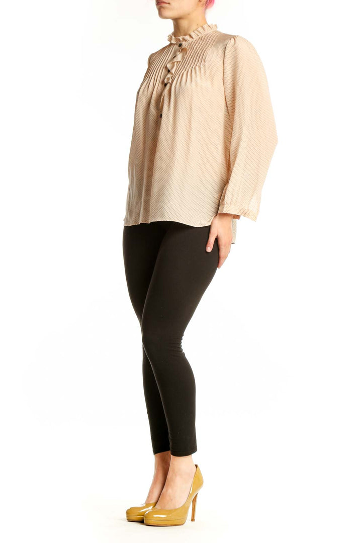 Cream silk pleated blouse with button-front closure and ruffled neckline by Rebecca Taylor