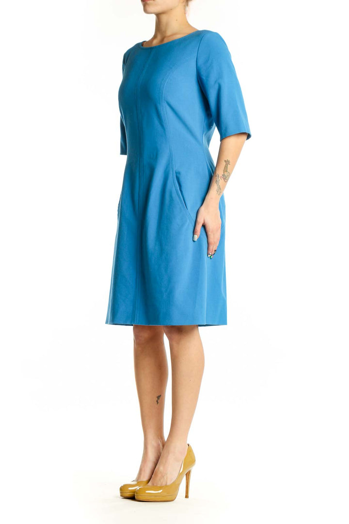 Front view of blue A-line half sleeve dress with boat neckline by Tahari Arthur S. Levine