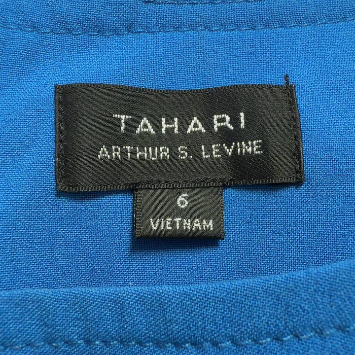 Tag view of blue A-line half sleeve dress showing vertical seaming detail by Tahari Arthur S. Levine