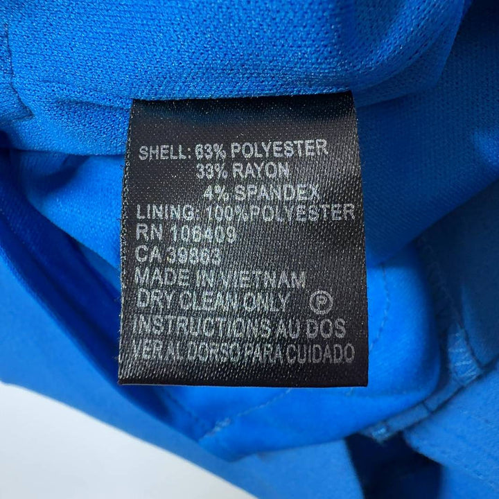 Tag view of blue A-line half sleeve dress showing vertical seaming detail by Tahari Arthur S. Levine