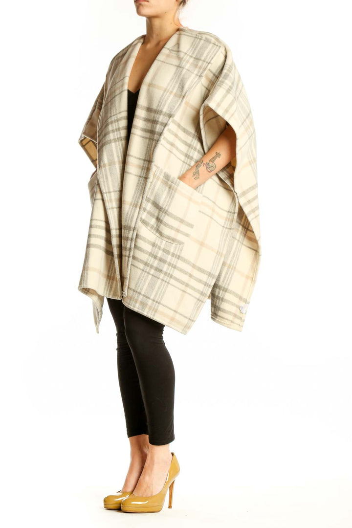 Cream and taupe plaid wool blend kimono cardigan with flutter sleeves and open front, worn over black top