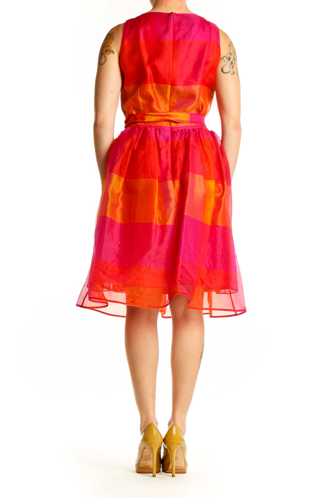 Back view of red orange patchwork midi dress showing colorblock design and A-line silhouette