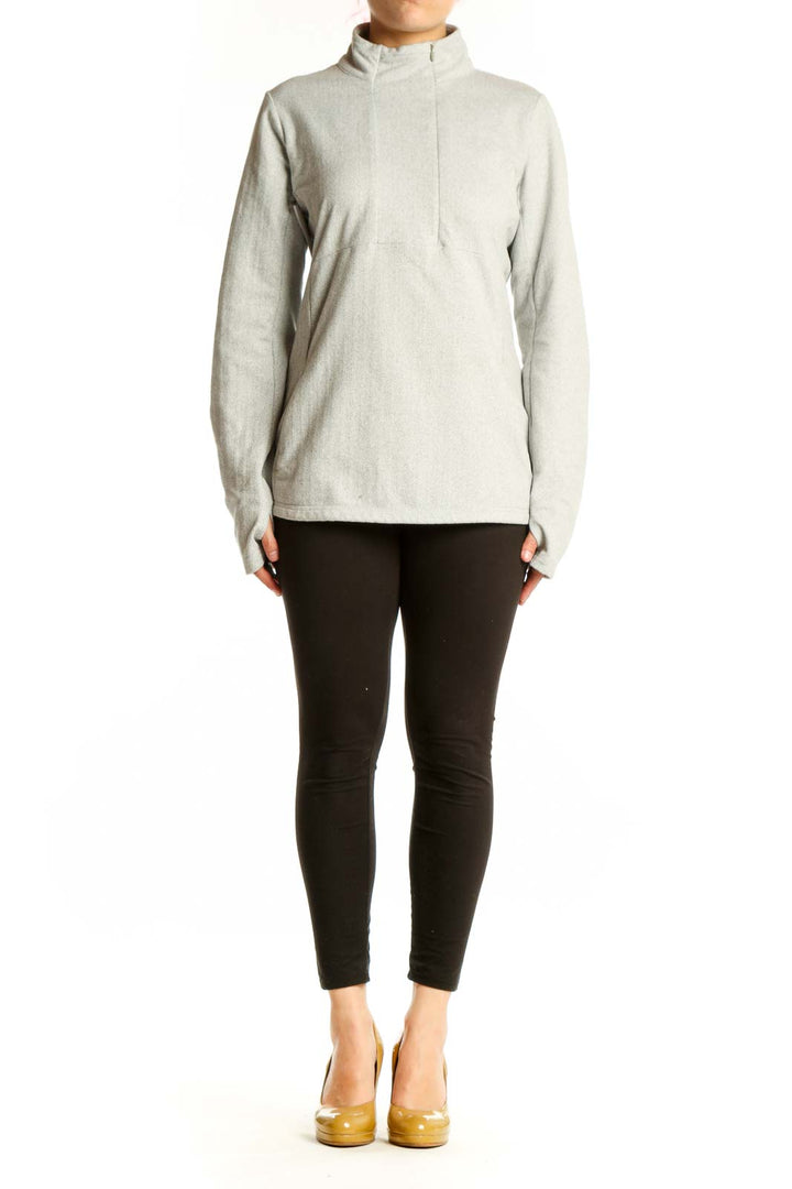 Cream Kyodan pullover sweatshirt with turtleneck and thumbholes, front view on model