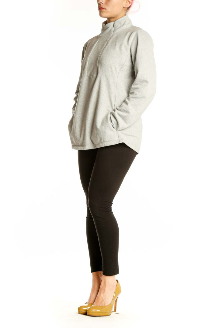 Cream Kyodan pullover sweatshirt with turtleneck and thumbholes, front view on model
