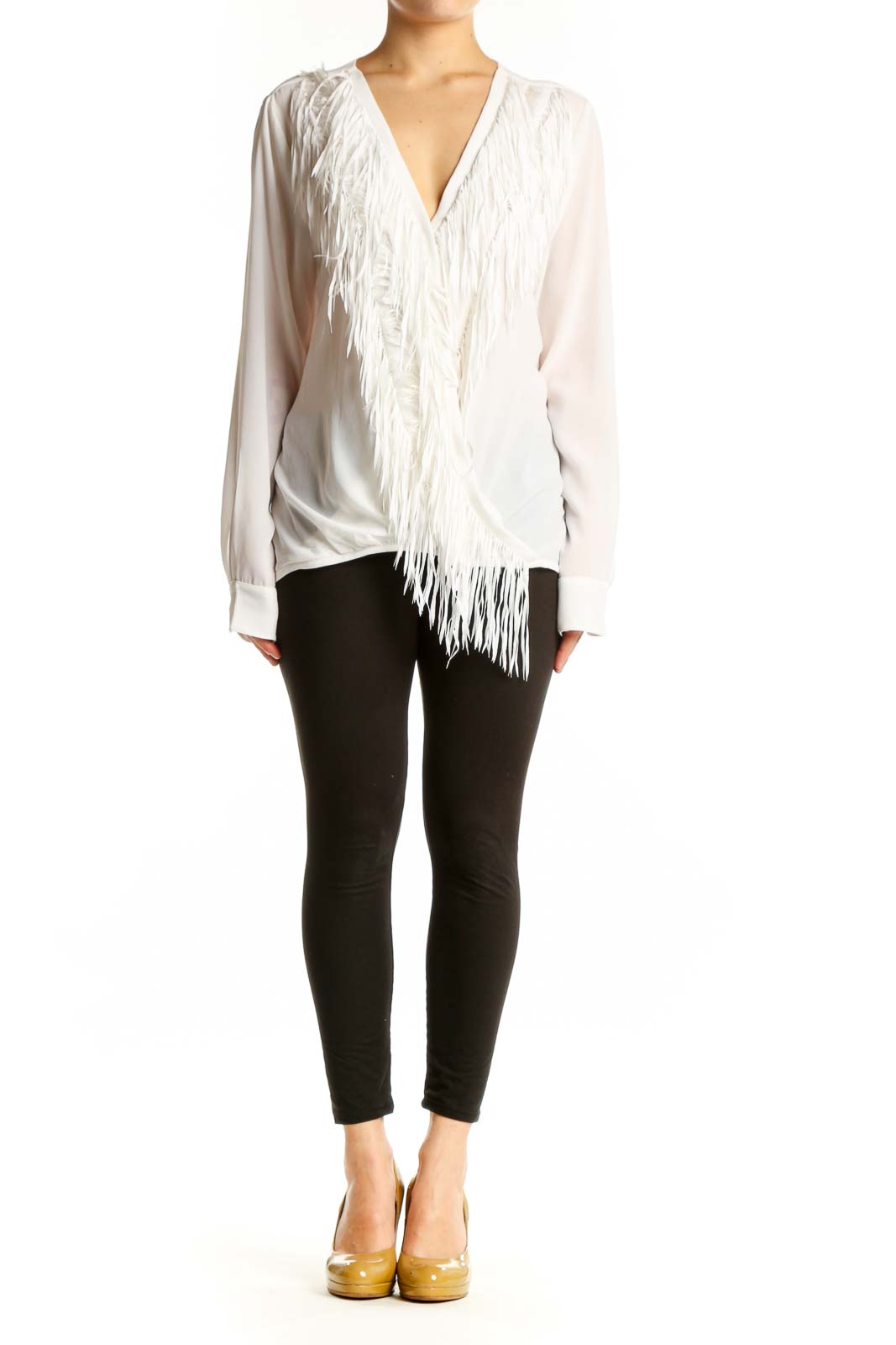 Cream wrap blouse with dramatic fringe detailing and V-neckline by Yoana Baraschi