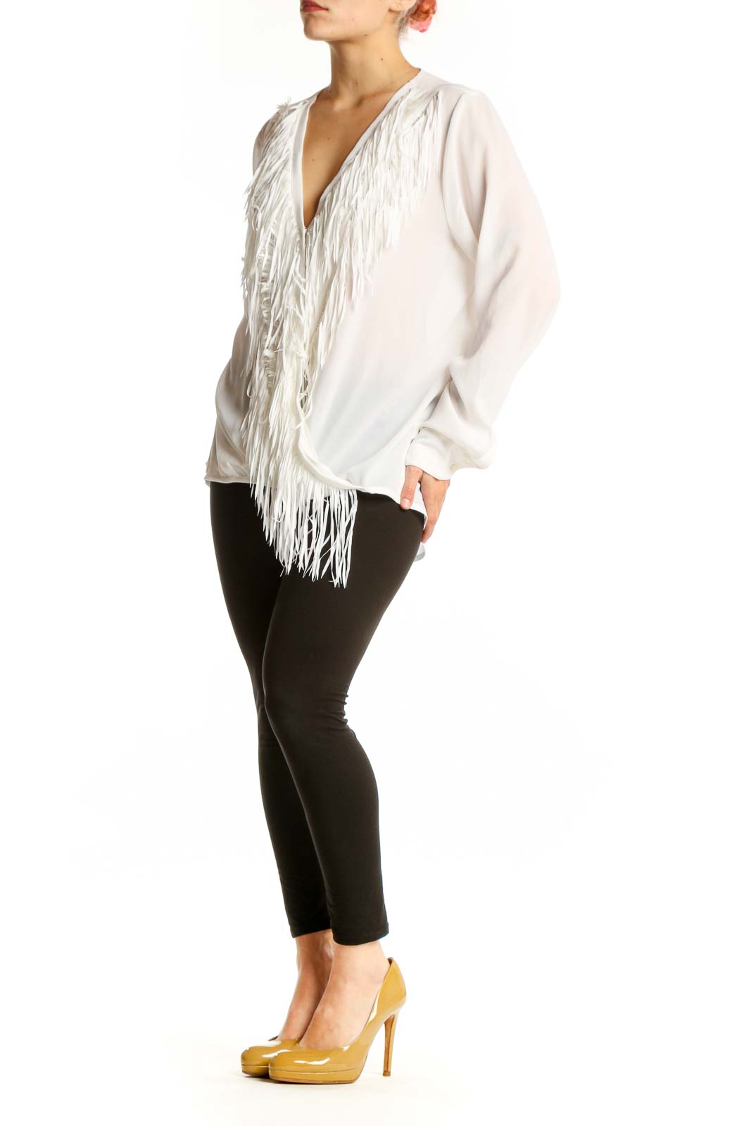 Cream wrap blouse with dramatic fringe detailing and V-neckline by Yoana Baraschi