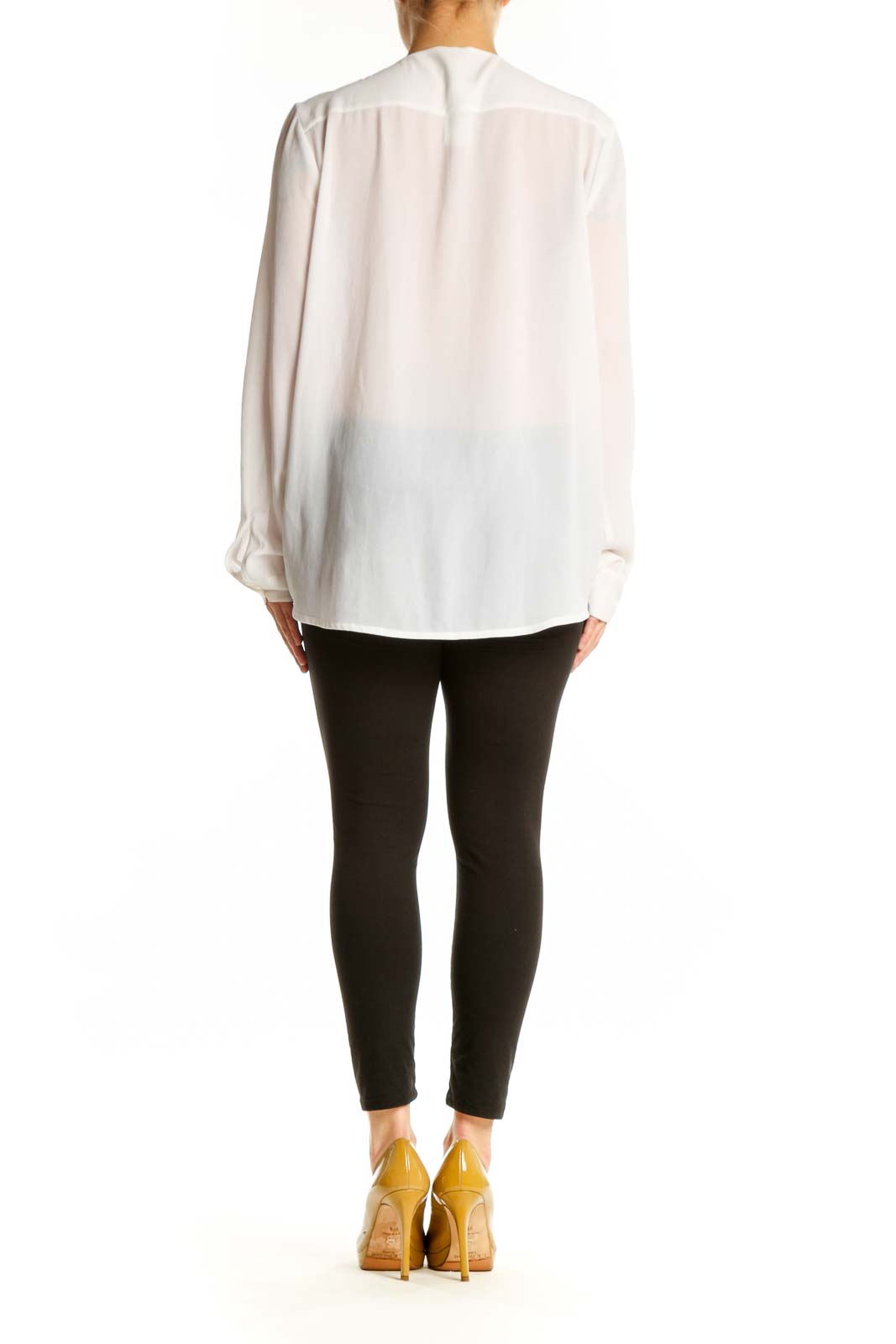Back view of cream fringe wrap blouse showing asymmetrical fringe design