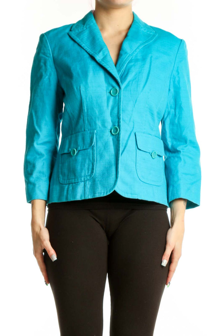 Front view of turquoise petite blazer from Ann Taylor Petites with notched lapels and patch pockets