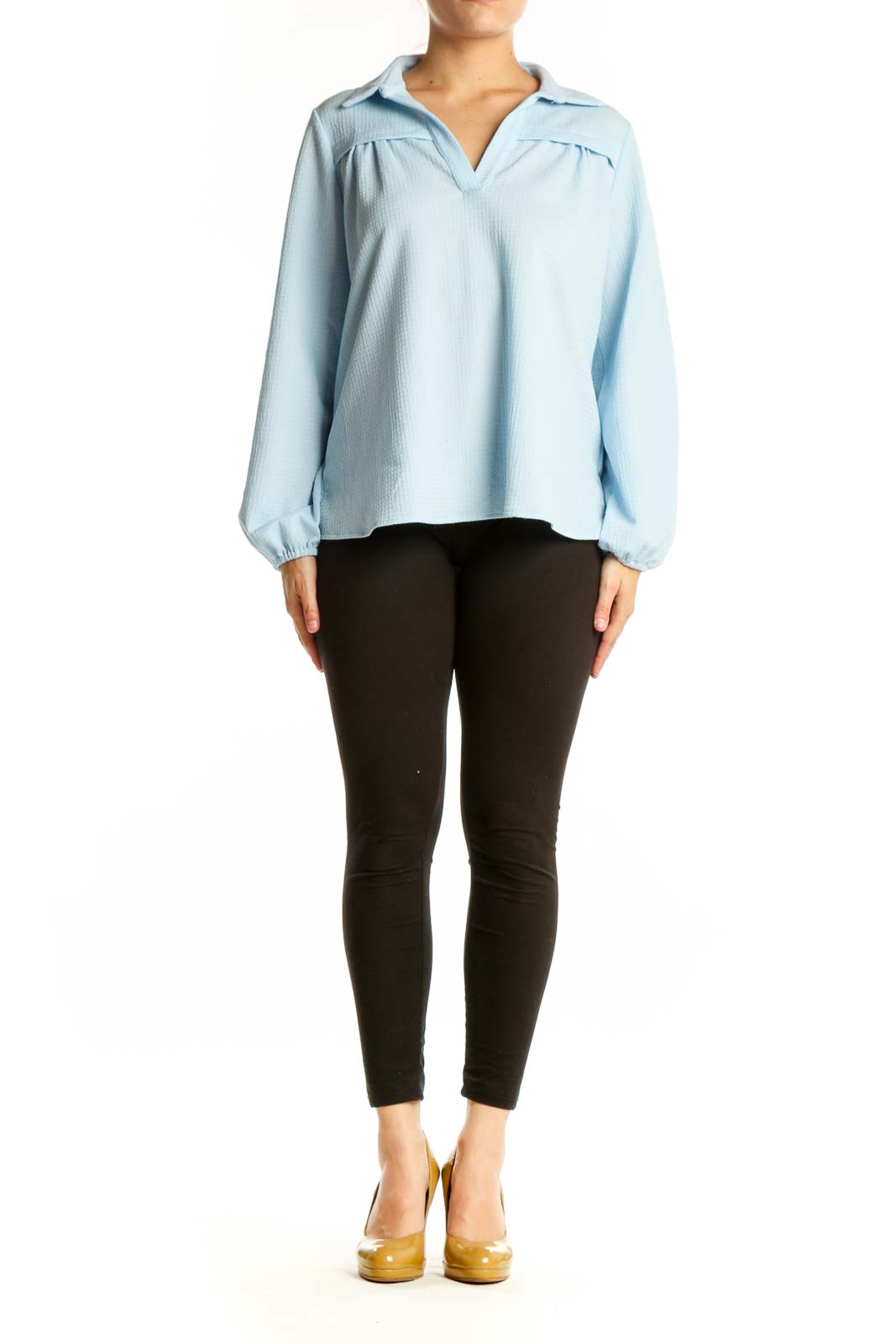 Light blue collared pullover top with pleated chest detailing and voluminous long sleeves