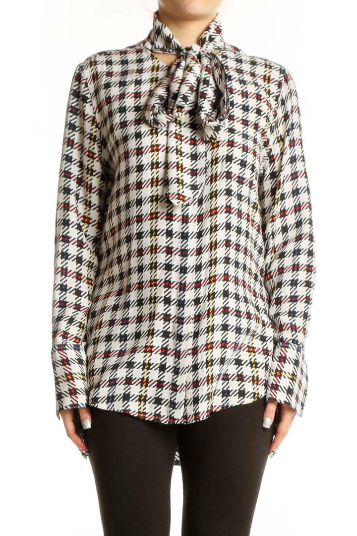 Front view of multicolor houndstooth silk blouse with pussy bow neckline by Equipment Femme