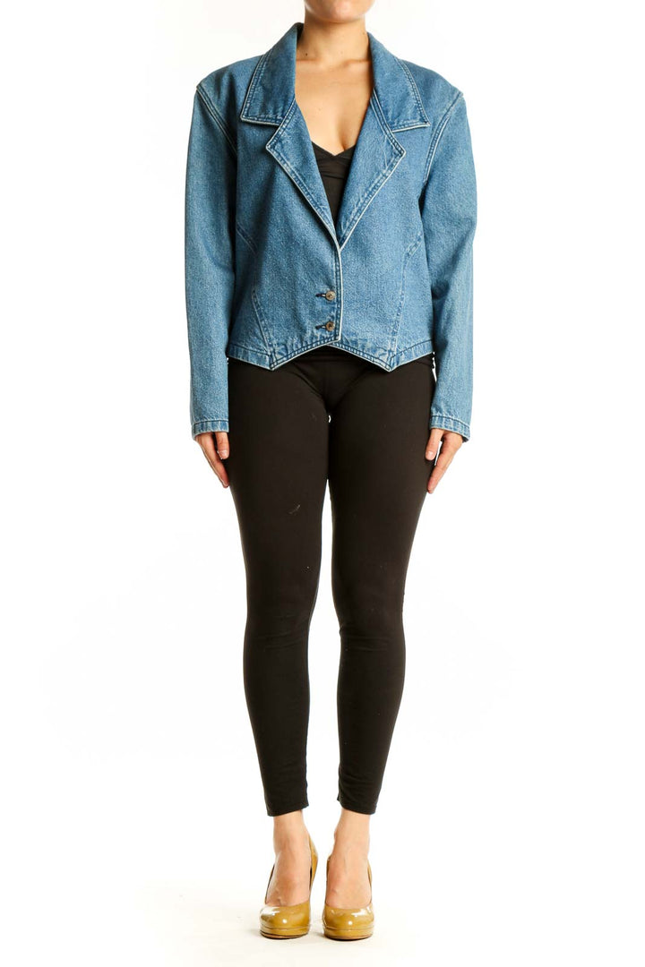 Front view of blue denim blazer with notched collar and single button closure